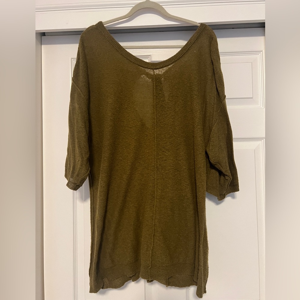 Free People light weight olive sweater with black silk ribbon tie in back